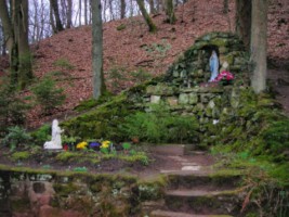 Une grotte de Lourdes est érigée à Bitche, dans la forêt entourant le collège Saint-Augustin. Construite à l'initiative d'un prêtre-professeur, elle est fidèlement entretenue et constitue un but apprécié de promenade.