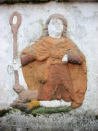 Saint Wendelin est représenté sur le socle de la croix.