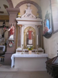 L'autel latéral droit de l'église de Lengelsheim est dédié à saint Laurent.