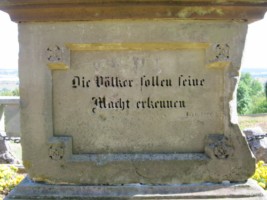 L'inscription de la quatrième face.